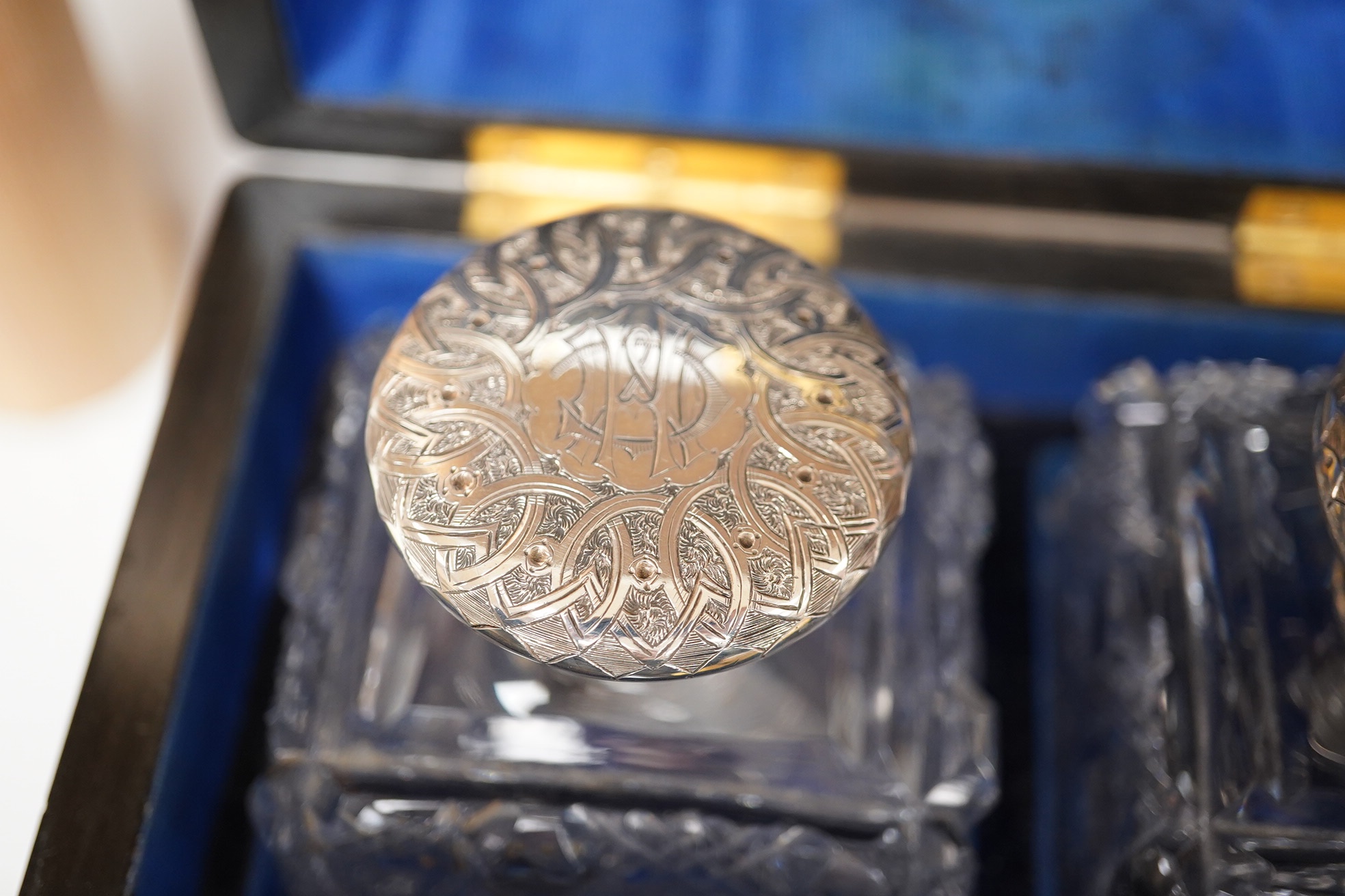 A Victorian burr walnut cased pair of silver topped perfume bottles, retailed by Piesse and Lubin, 11cm high. Condition - box cracked at the top/side, bottles good